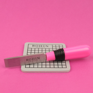 Buttonhole cutter and safety mat